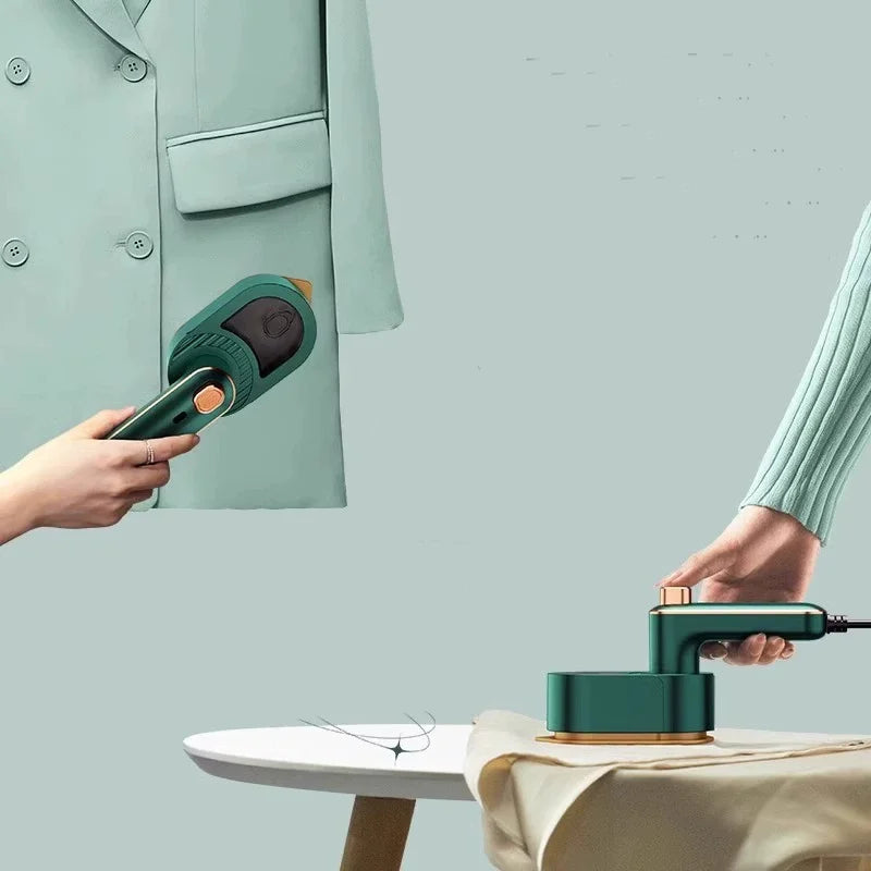 Défroisseur vapeur portable Vindora vert sauge sur fond textile